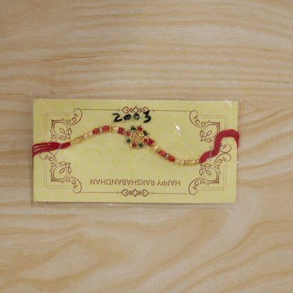 Traditional Golden Floral Meenakari Rakhi with Pearls & Red Beads for Brother - Rakshabandhan Gift