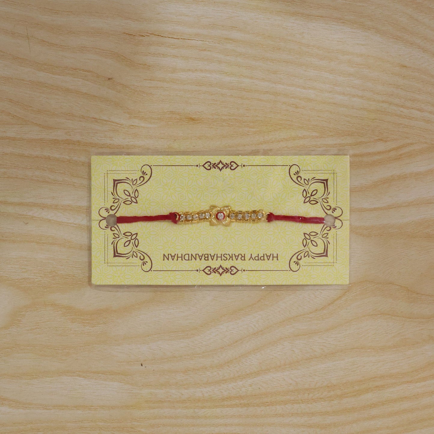 Elegant Gold-Plated Kundan & American Diamond Studded Rakhi for Brother - Raksha Bandhan Special