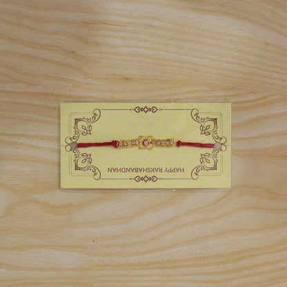 Elegant Gold-Plated Kundan & American Diamond Studded Rakhi for Brother - Raksha Bandhan Special