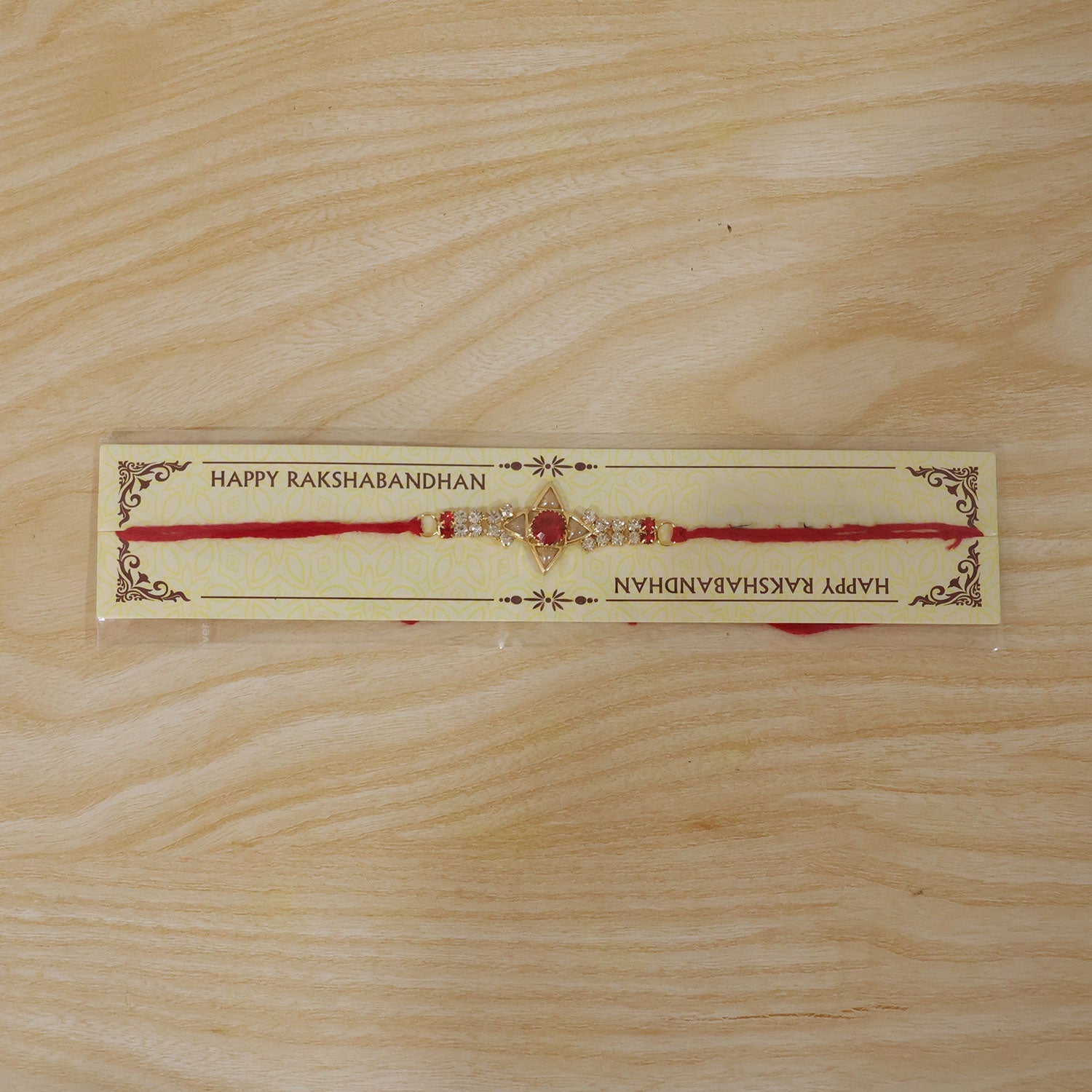 Sparkling Gold Star Rakhi with White & Red Stones for Brother - Raksha Bandhan Special