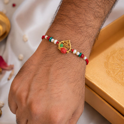 Golden Shree Krishna Rakhi with Pearls & Beads for Beloved Brother
