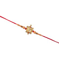 Traditional Golden Om Rakhi – Elegant & Sacred Brother Gift
