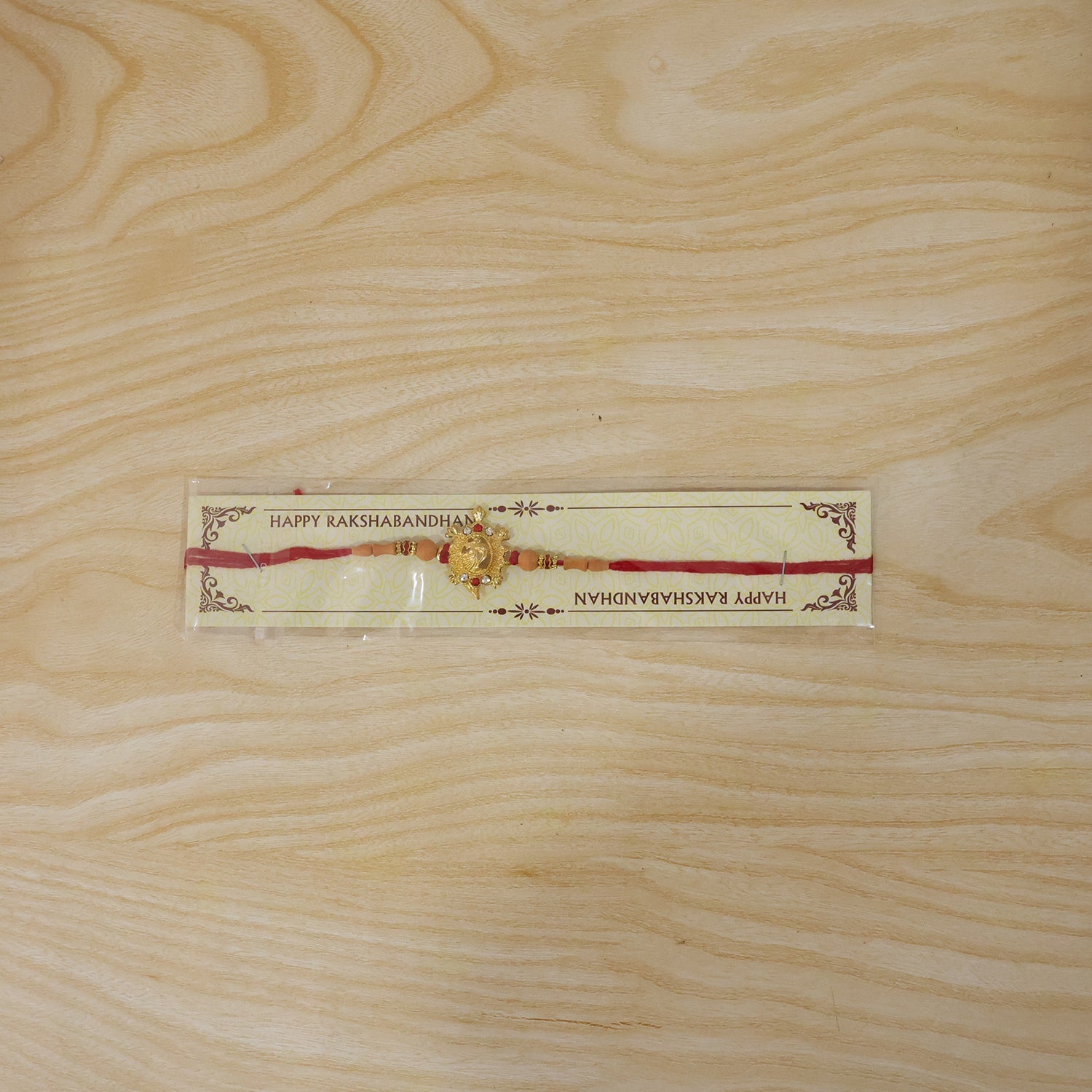 Traditional Golden Om Rakhi with Beads for Brother - Rakshabandhan Gift
