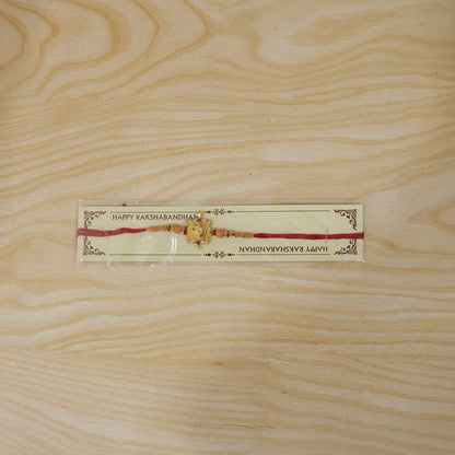 Traditional Golden Om Rakhi with Beads for Brother - Rakshabandhan Gift