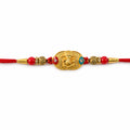Gold Plated Ganesha Rakhi – Red Beads for Raksha Bandhan