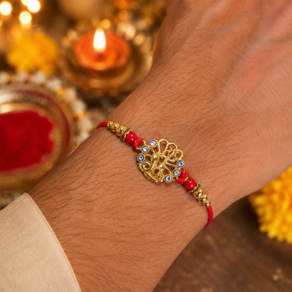 God Charm Rakhi with Blue & Red Stones for Brother - Rakshabandhan Gift