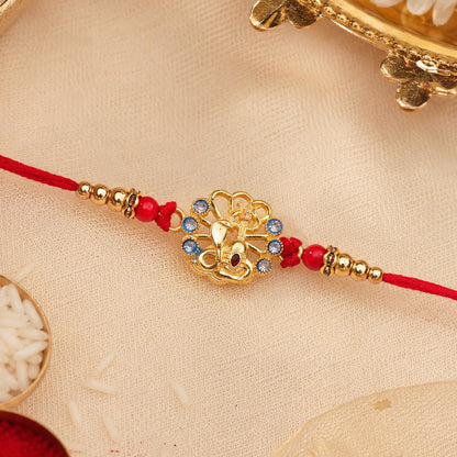 God Charm Rakhi with Blue & Red Stones for Brother - Rakshabandhan Gift
