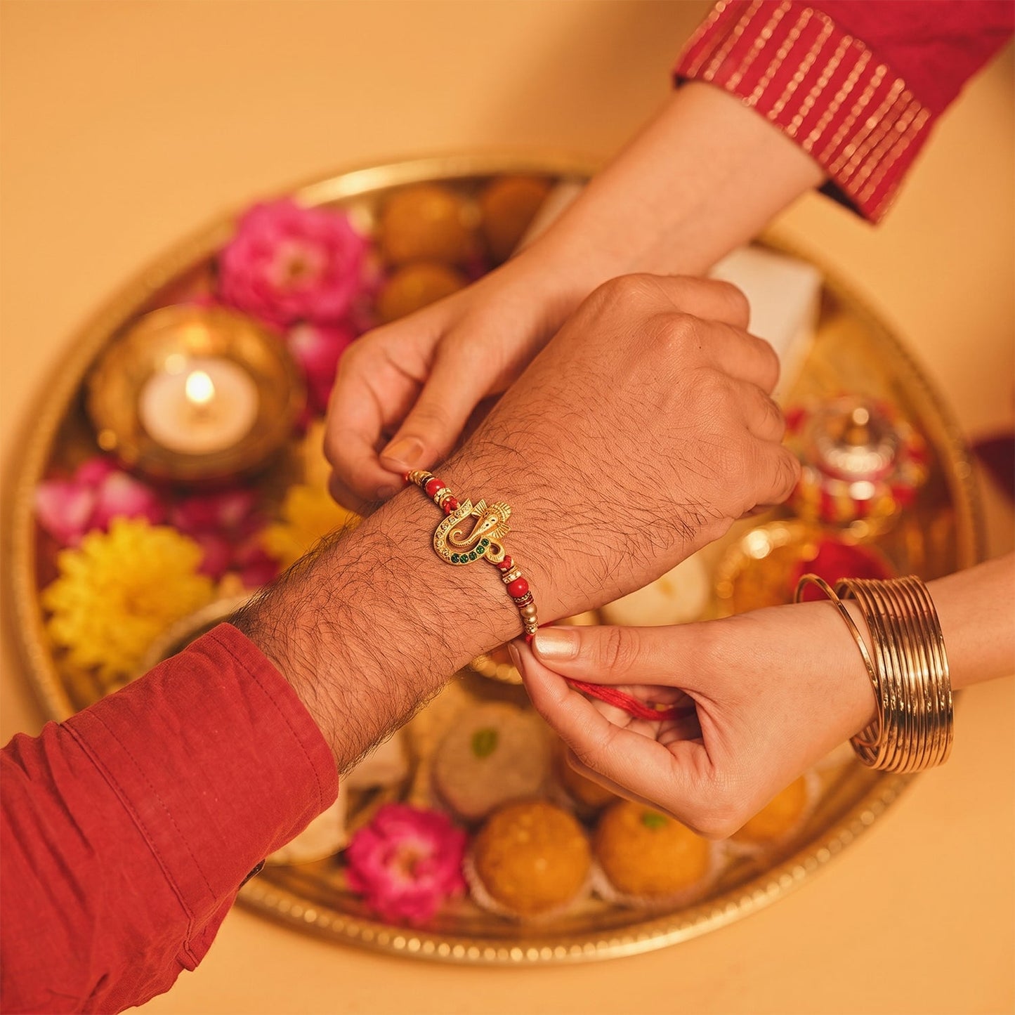 Golden Ganesha Rakhi with Beads for Brother - Raksha Bandhan Special