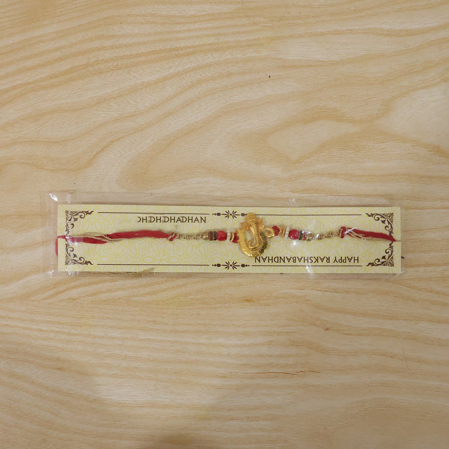 Golden Ganesha Rakhi with Beads for Brother - Raksha Bandhan Special
