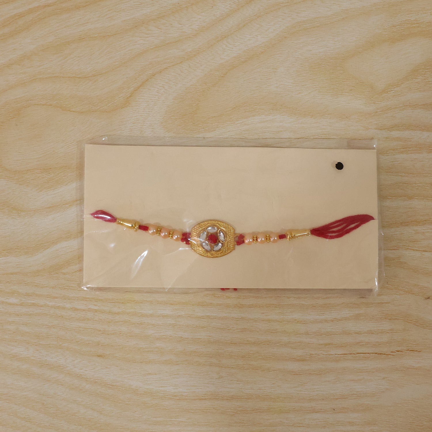Gold-Plated Floral AD Stone Rakhi for Brother - Rakshabandhan Gift