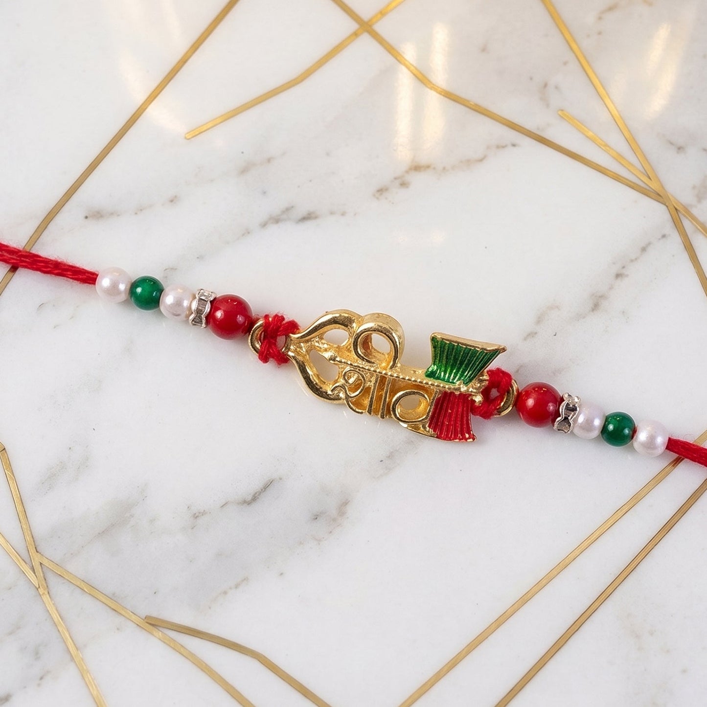 Elegant Golden Shiv Meenakari Rakhi with Beads for Brother