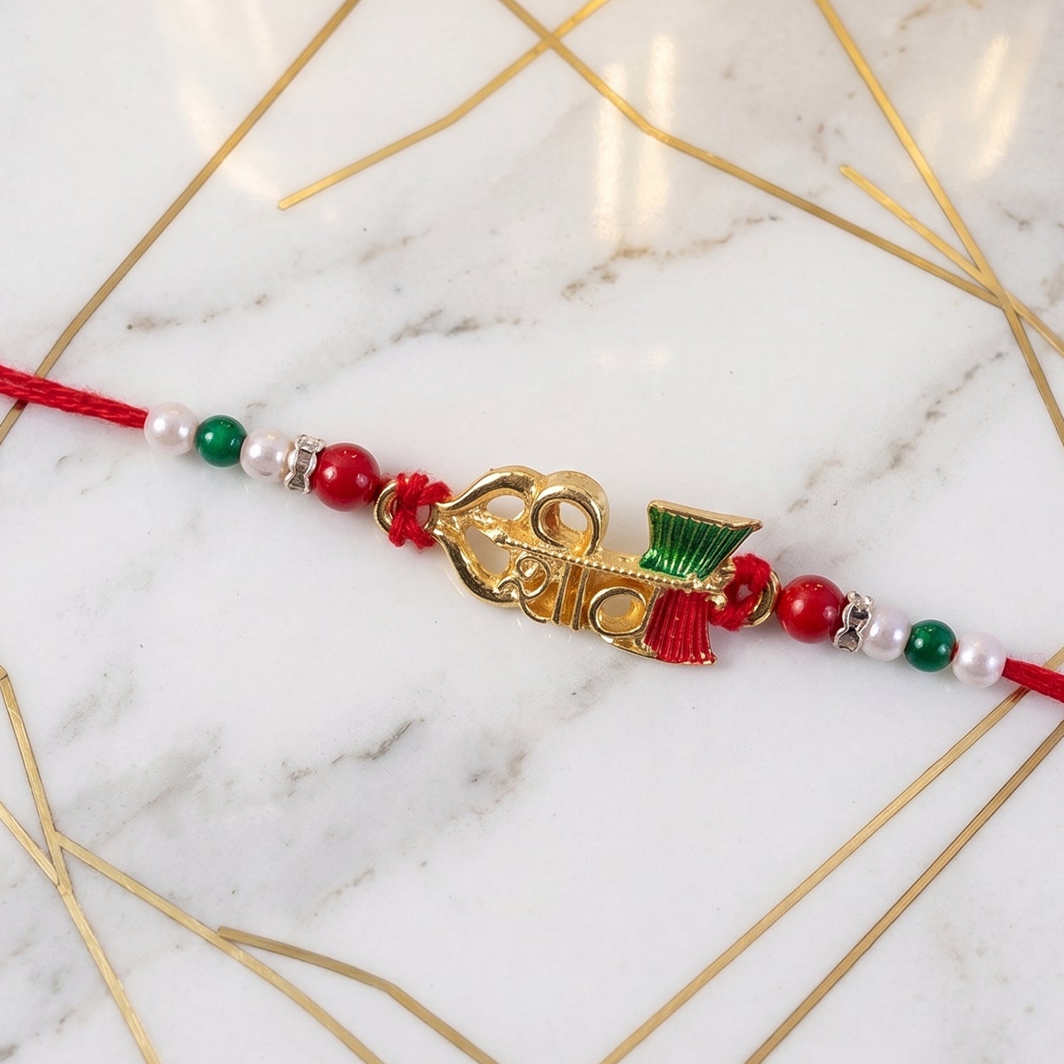 Elegant Golden Shiv Meenakari Rakhi with Beads for Brother