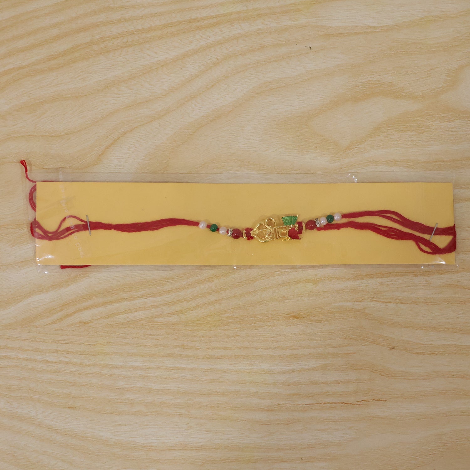 Elegant Golden Shiv Meenakari Rakhi with Beads for Brother