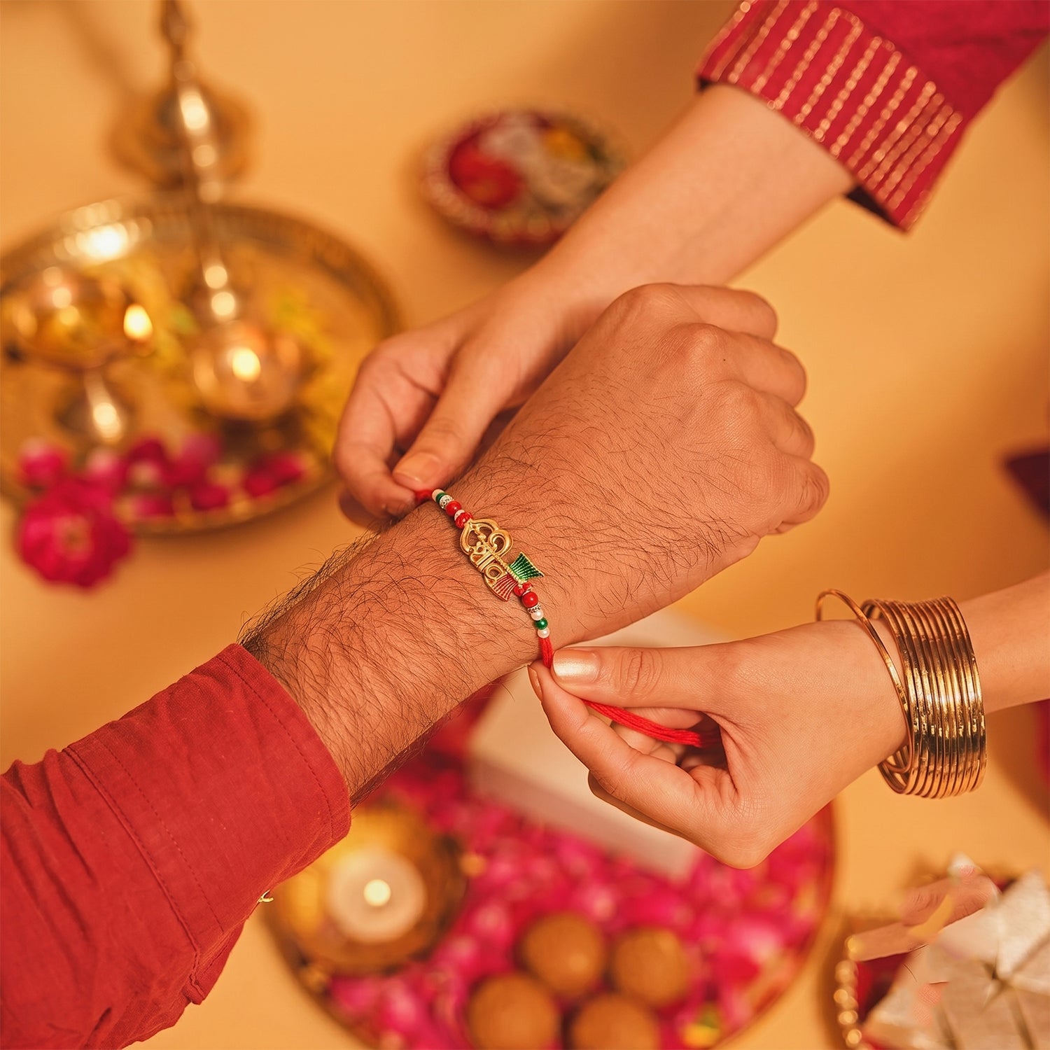 Elegant Golden Shiv Meenakari Rakhi with Beads for Brother