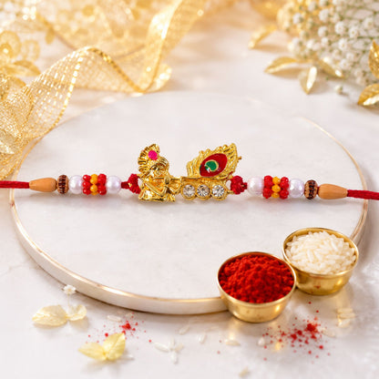 Lord Krishna with Peacock Feather Golden Rakhi with AD Stones for Brother