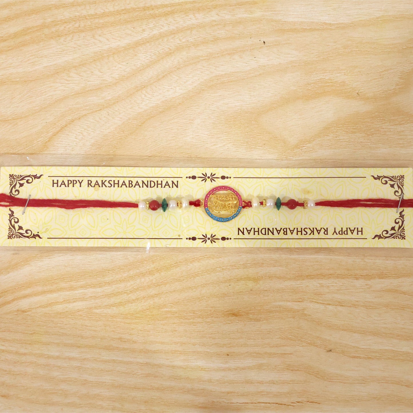 Golden Jay Shree Shyam Rakhi for brother, presented on a festive tray