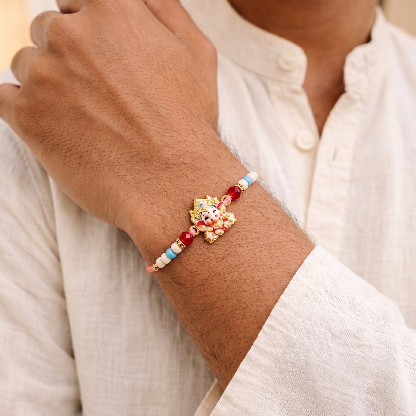 Cute Golden Rakhi with Colourful Beads for Brother