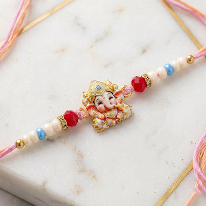 Cute Golden Rakhi with Colourful Beads for Brother