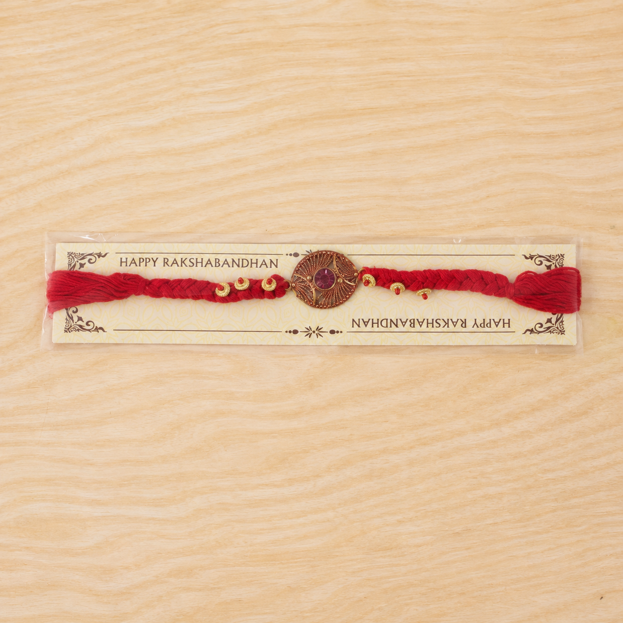 Handcrafted Woven Thread Rakhi with Purple Stone for Brother