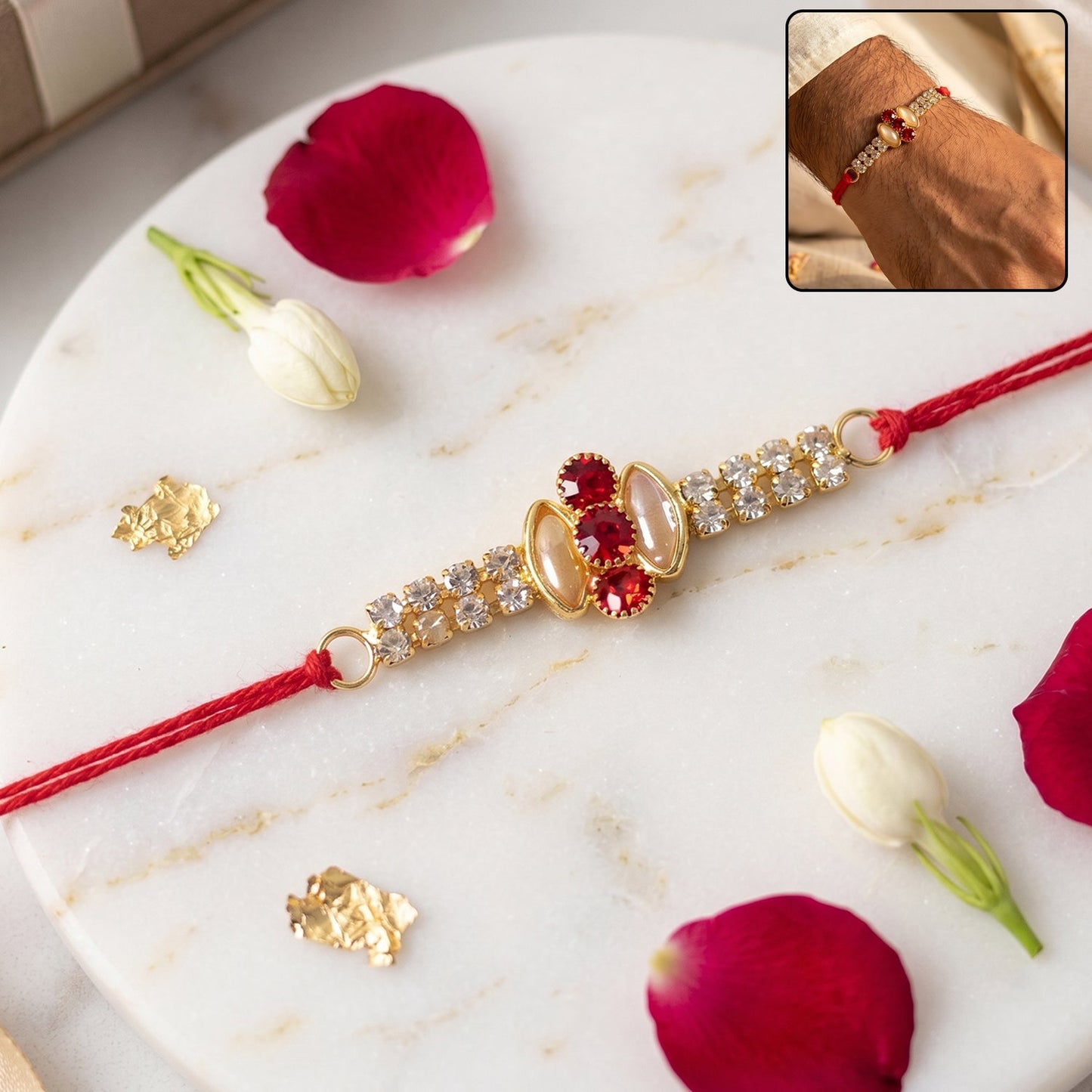 Elegant gold rakhi with pink stone & AD studded design