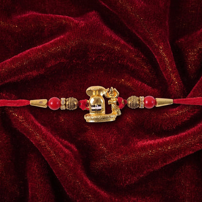 Traditional Golden Antique Shivling Motif Rakhi with Red Beads for Brother