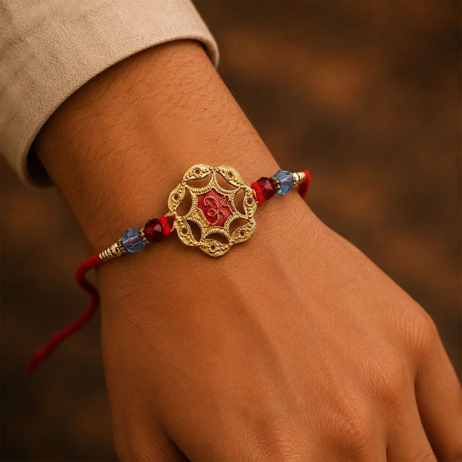 Golden Floral Rakhi with Red Stone & Crystal Beads for Brother