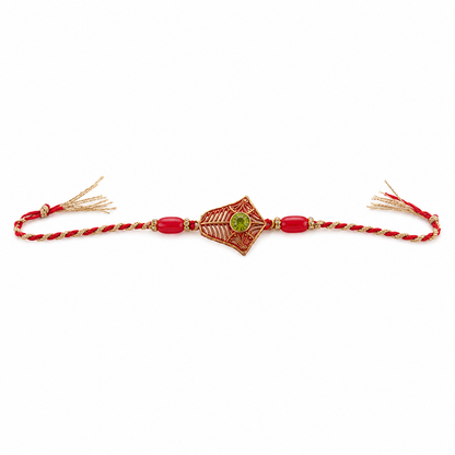 Golden Floral Rakhi with Green Stone & Red Beads for Brother