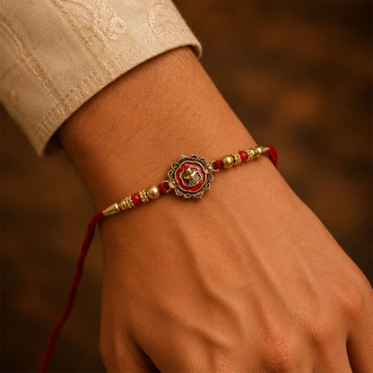 Golden Meenakari Floral Rakhi with Crystal Beads for Brother