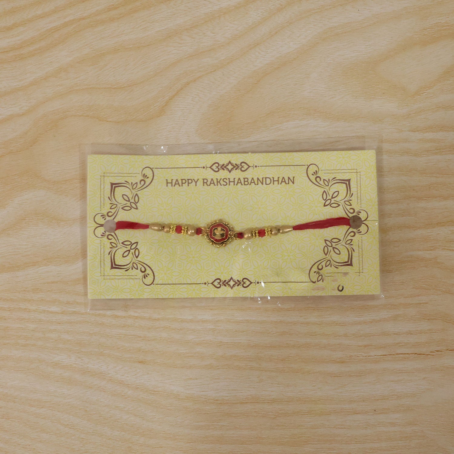 Golden Meenakari Floral Rakhi with Crystal Beads for Brother