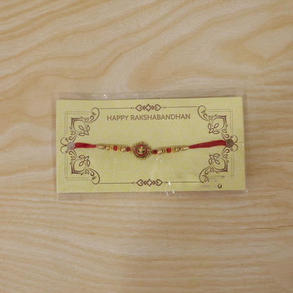 Golden Meenakari Floral Rakhi with Crystal Beads for Brother