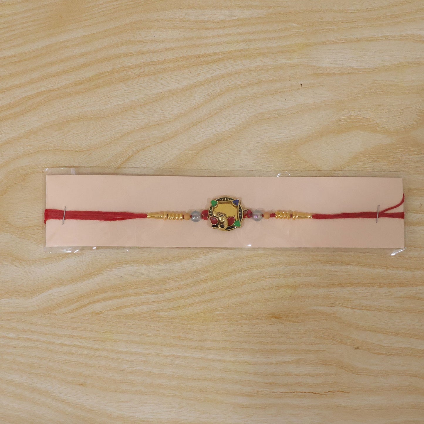 Golden Elephant Rakhi with Colourful Stones for Brother