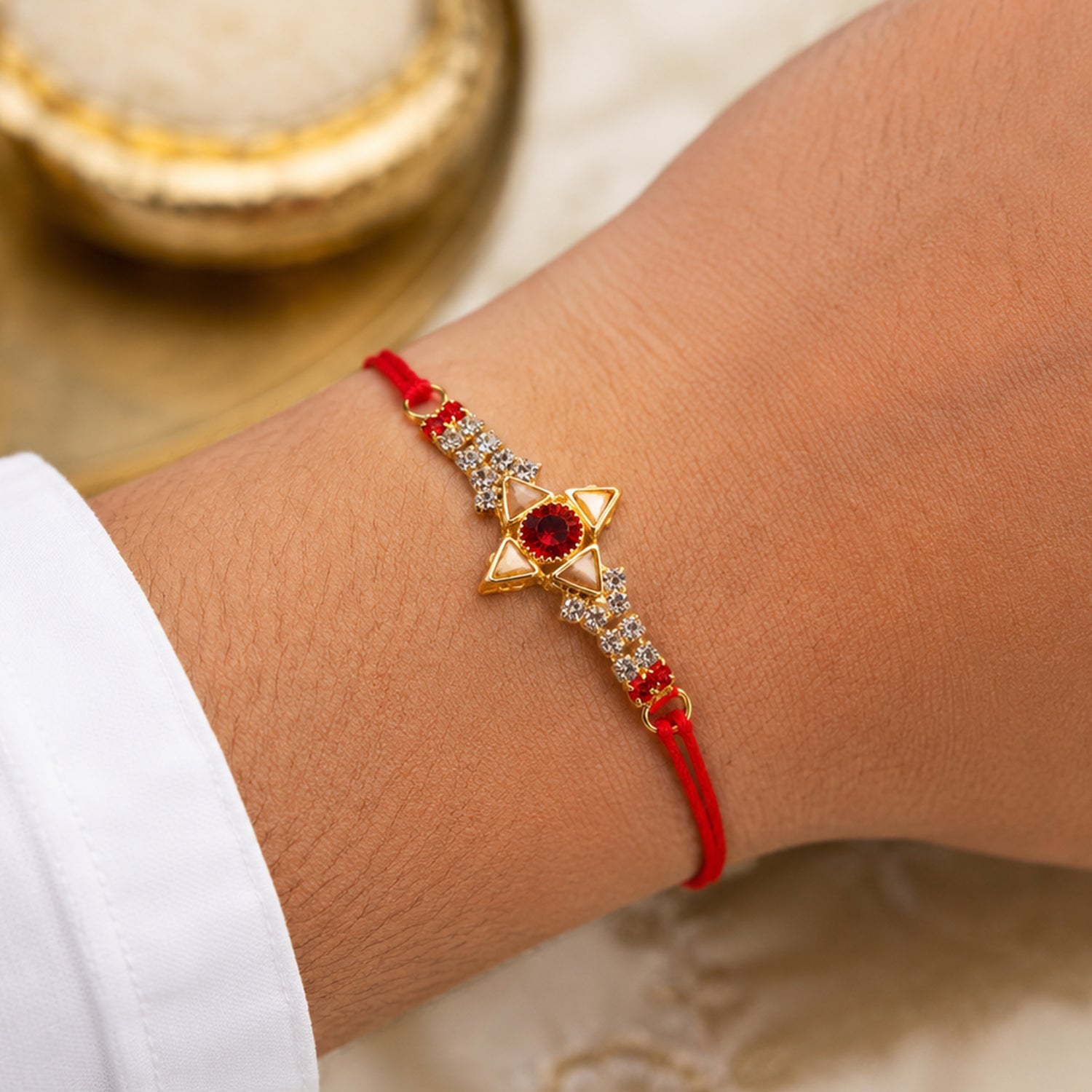 Sparkling Gold Marquise Rakhi with Red Stone & AD for Brother
