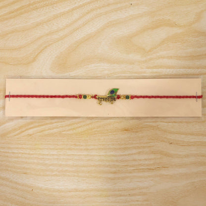 Lord Krishna Text Rakhi with Peacock Feather for Brother