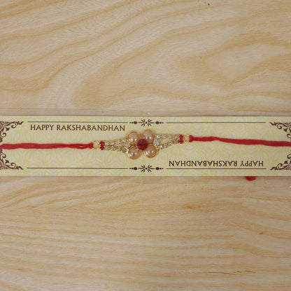 Designer Gold Pearl Flower Rakhi with AD Stones for Brother