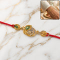 Meenakari Rakhi – Golden Peacock Design with AD Stones