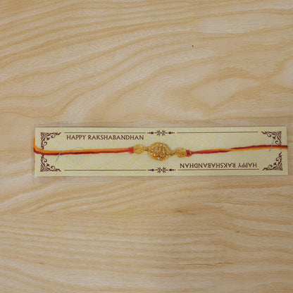 Traditional Golden Rakhi with Leaf Design for Brother