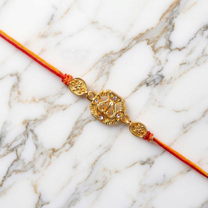 Traditional Golden Rakhi with Leaf Design for Brother