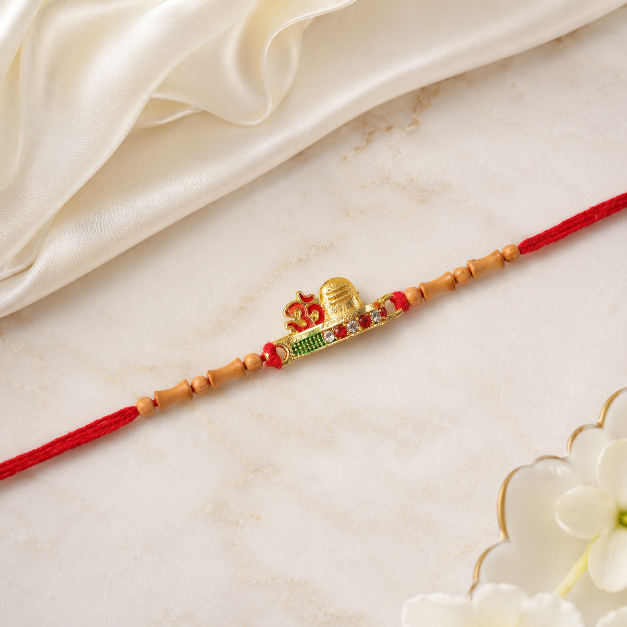 Simple Golden Om Rakhi with Beads for Brother - Raksha Bandhan Special