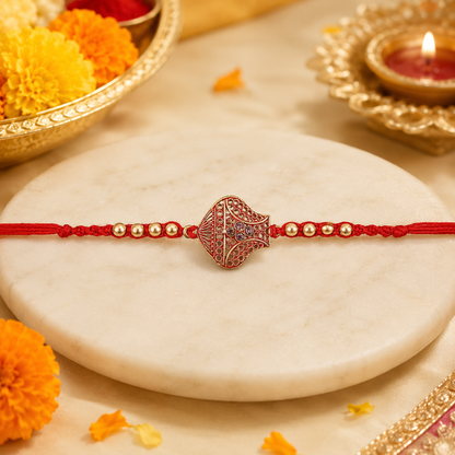 Antique Leaf-Shaped Jali Rakhi with Golden Beads for Brother