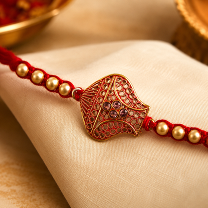 Antique Leaf-Shaped Jali Rakhi with Golden Beads for Brother
