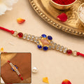 AD Stone Rakhi – Elegant Royal Blue & White Design for Brother