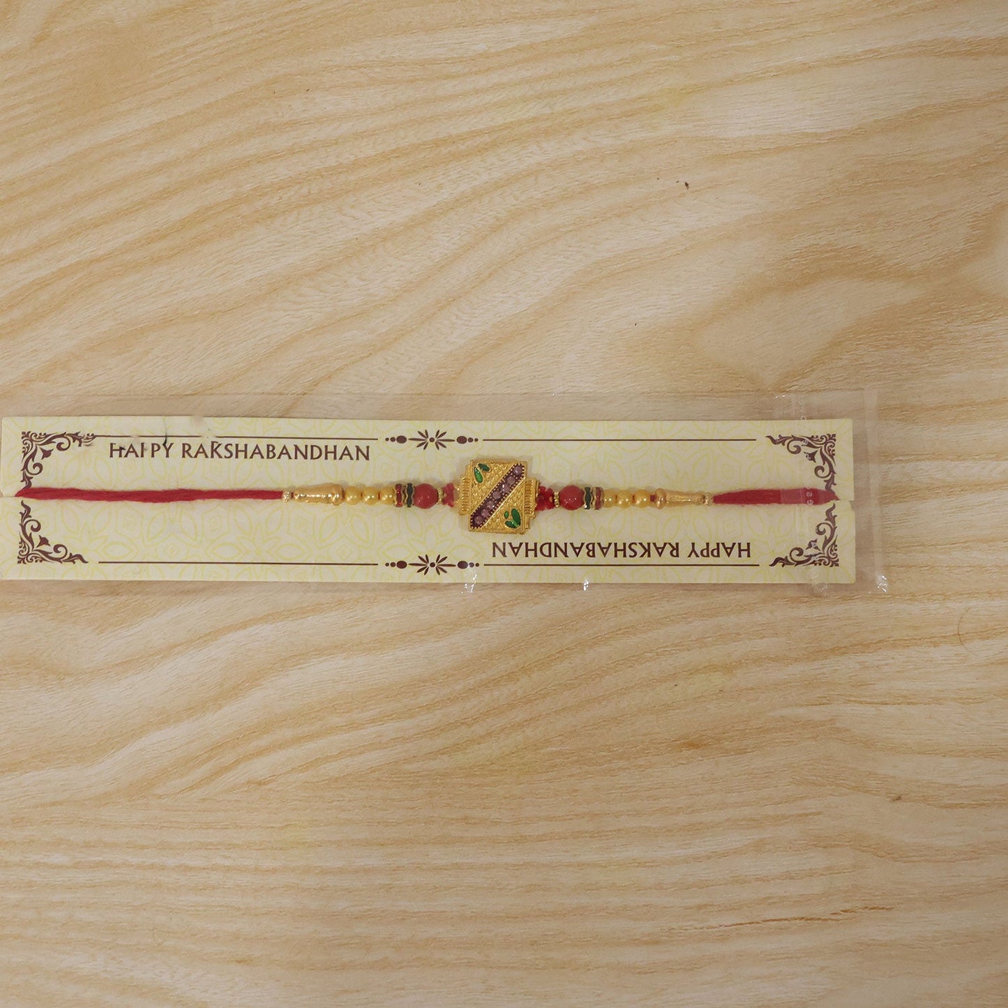 Golden Square Meenakari Rakhi with Beads for Brother