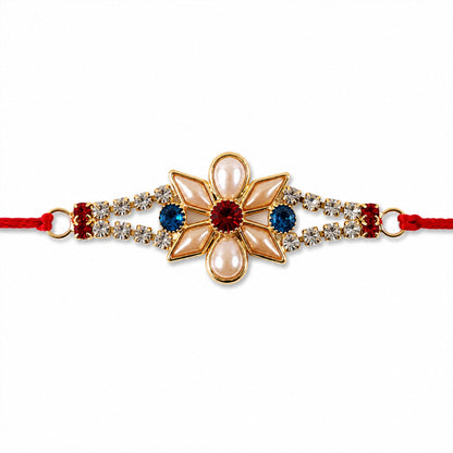 Designer Pearl Flower Rakhi with Blue & Red Stones for Brother