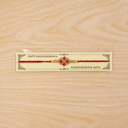 Sparkling AD Stone Band Rakhi with Red Stones for Brother
