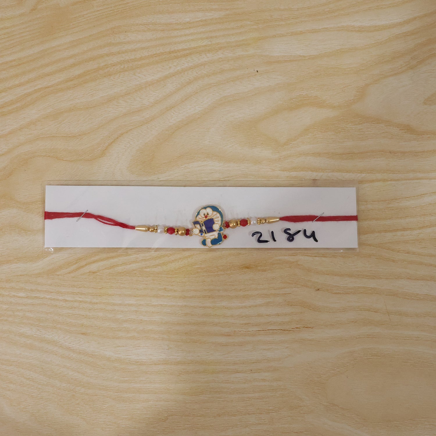 Doraemon Cartoon Kids Rakhi with Beads for Little Brother