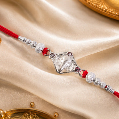 Silver-Tone Ganehsa Rakhi with Red Stone & Pearls for Brother