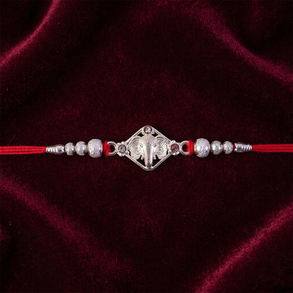 Silver-Tone Ganehsa Rakhi with Red Stone & Pearls for Brother