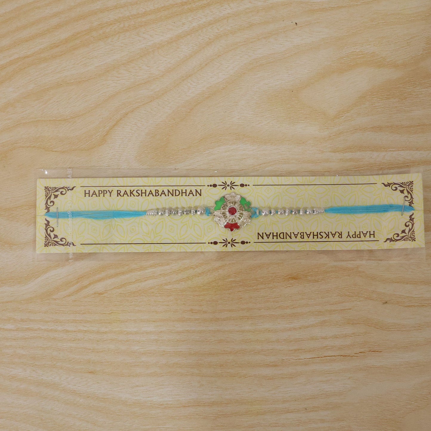 Silver Meenakari Floral Rakhi with Beads for Brother