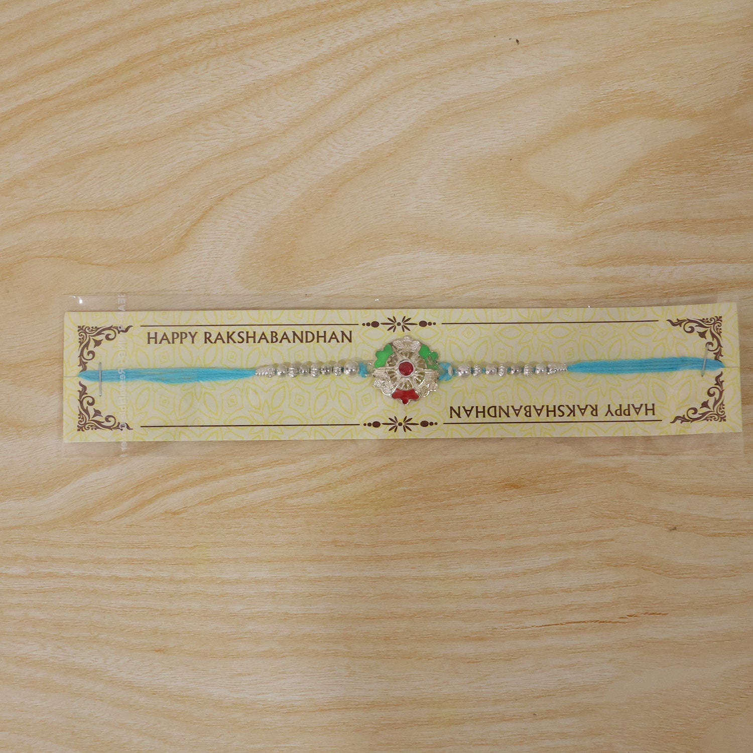Silver Meenakari Floral Rakhi with Beads for Brother