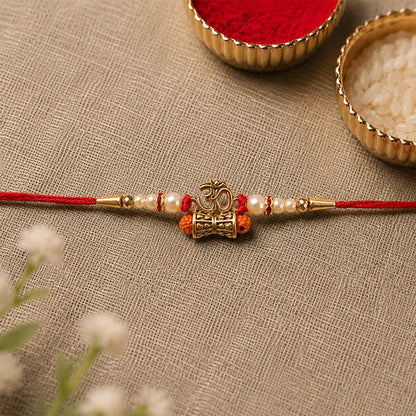 Traditional Golden Om Rakhi with Rudraksha & Pearls for Brother